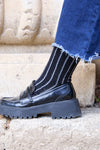 Calcetines negros con canalé brillantes. hechos con algodón 