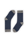 Calcetines azul oscuro de canalé, caña alta, 90 % algodón y logo en la puntera; tejidos en España.