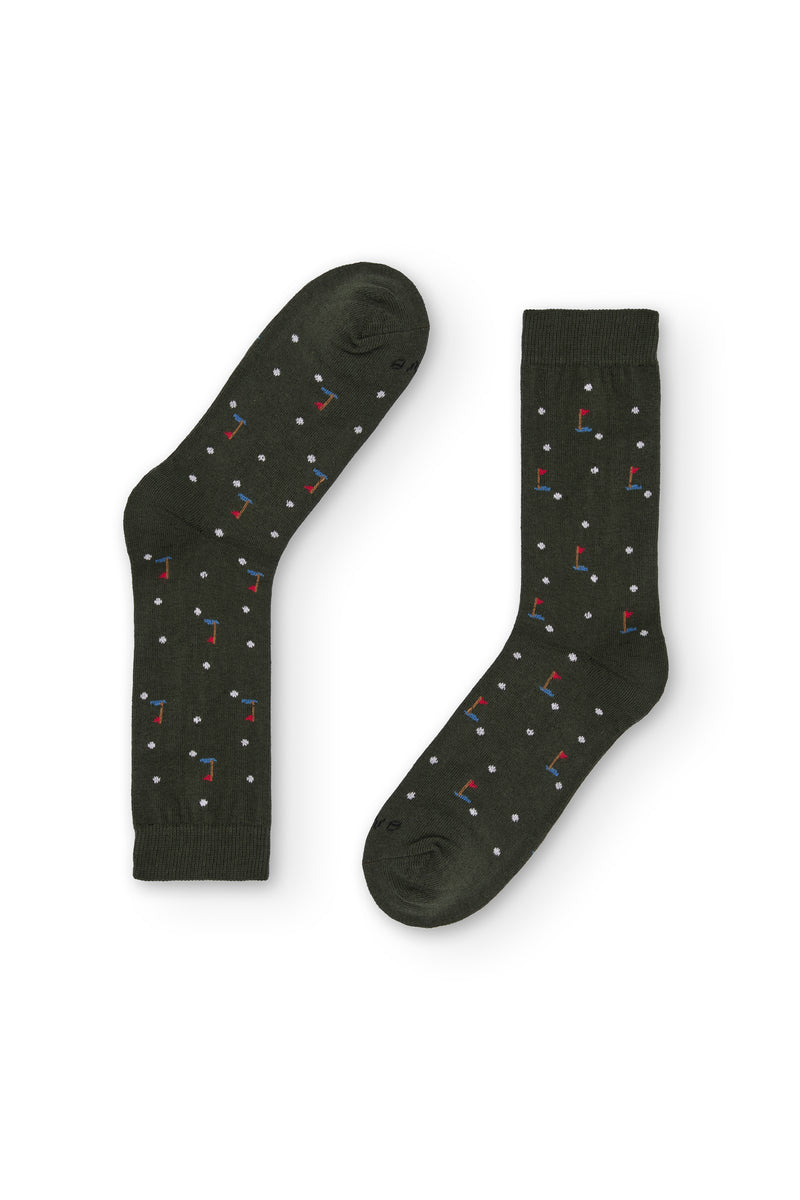 Calcetines verde con estampado de golf, caña media, 90 % algodón y logo en la puntera, tejidos en España.