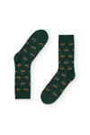 Calcetines verdes con estampado de monos, caña media, 90 % algodón y logo en la puntera, tejidos en España.
