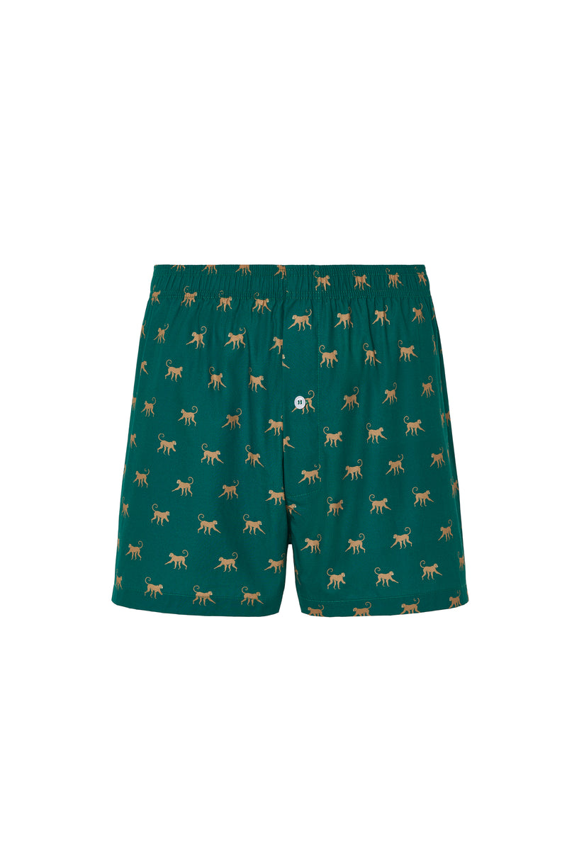 Calzoncillo verde 100 % algodón con estampado de mono, cintura elástica y cierre frontal de botones.