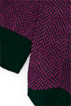 Calcetines mid-calf verde y rosa con diseño de espiga, mezcla de algodón y lycra, detalle NAIVE en la punta, fabricación española.