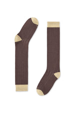 https://cdn.shopify.com/s/files/1/0042/1468/5765/files/Calcetin_largo_liso_line_marron.jpg?v=1693911744
